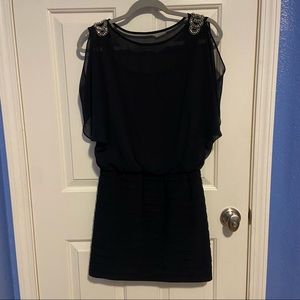Navy blue dress with bead accents on the shoulders